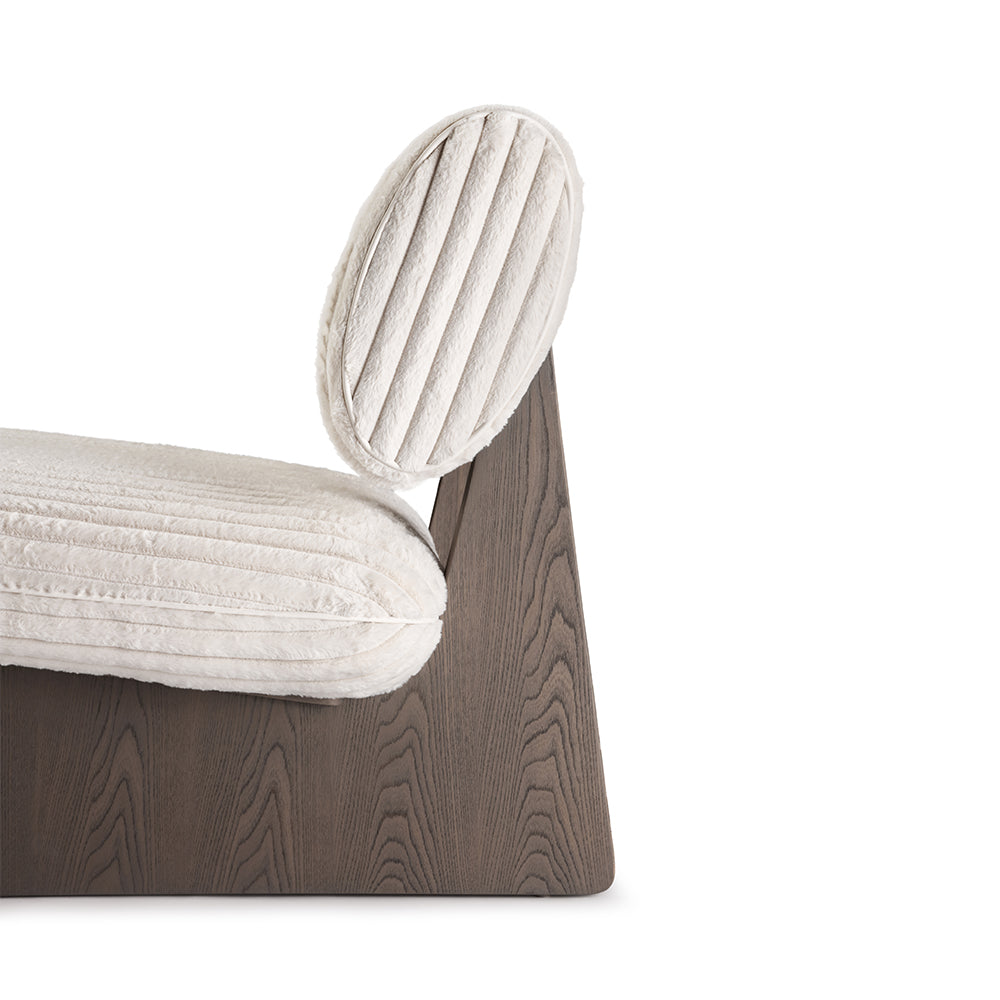 Close-up of Wynn chair showing soft fabric and curved contours