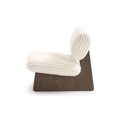 side view of Wynn lounge chair showing sculpted ergonomic curves