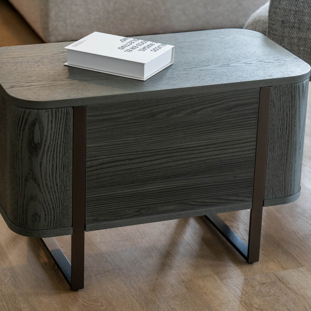Contemporary grey bedside nightstand with storage drawers and minimalist style Scenario