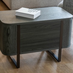 Contemporary grey bedside nightstand with storage drawers and minimalist style Scenario