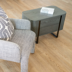 Contemporary grey bedside nightstand with storage drawers and minimalist style