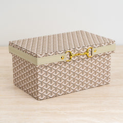 Compact multi-purpose storage chest for everyday essentials.