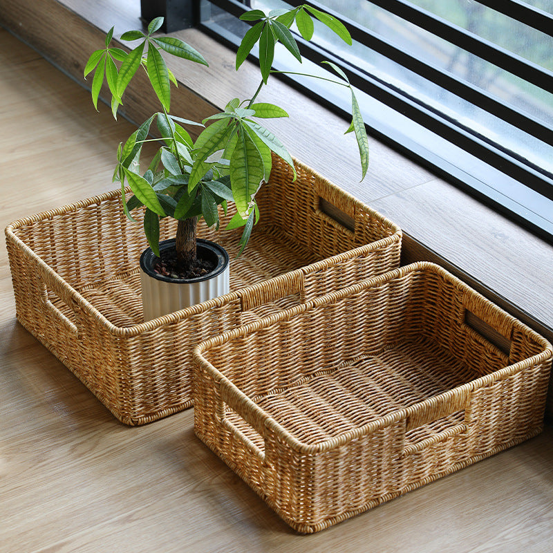 Elegant rectangular plastic rattan storage box with handle, combining practicality and timeless design for home organization.