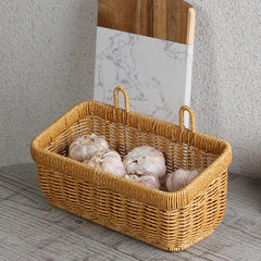 Elegant traditional storage basket with a timeless woven design, crafted from durable plastic rattan for long-lasting use.