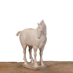 Detailed resin sculpture of horse in powerful stance with classic finish