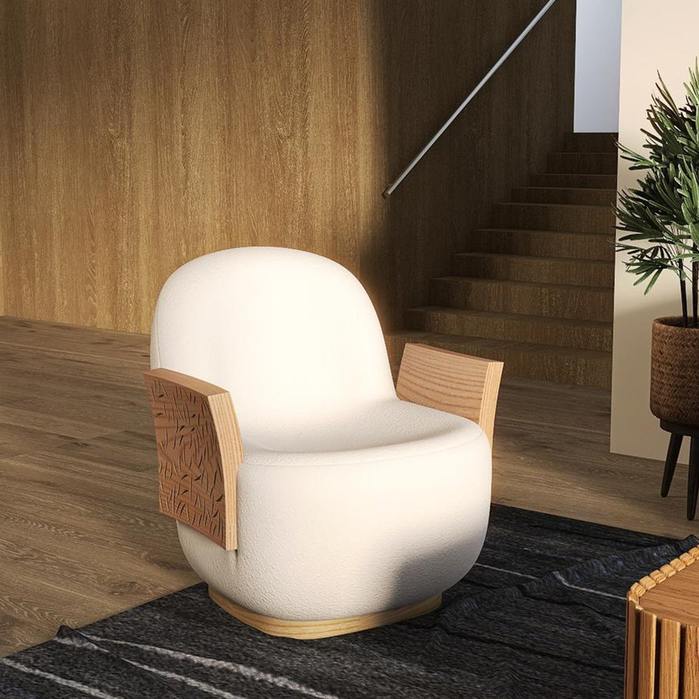 Elegant designer lounge chair in soft chenille with sculptural wooden panels, ideal for bedrooms or living rooms.