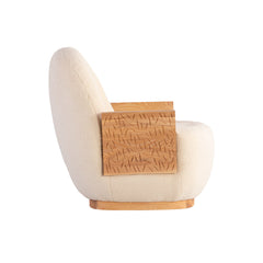 Contemporary accent chair with plush chenille upholstery and curved silhouette for stylish interiors.