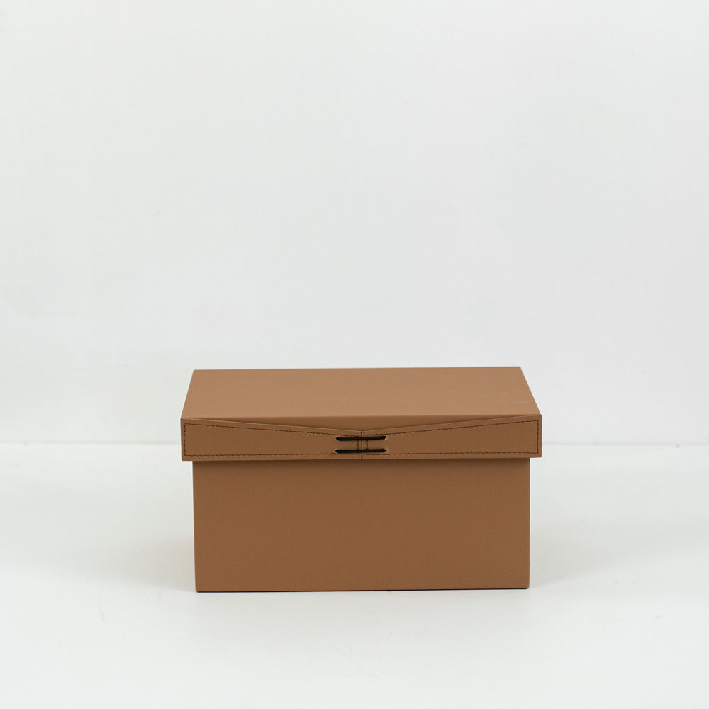 Sleek PU leather storage box with soft velvet lining, perfect for modern home or office organization.