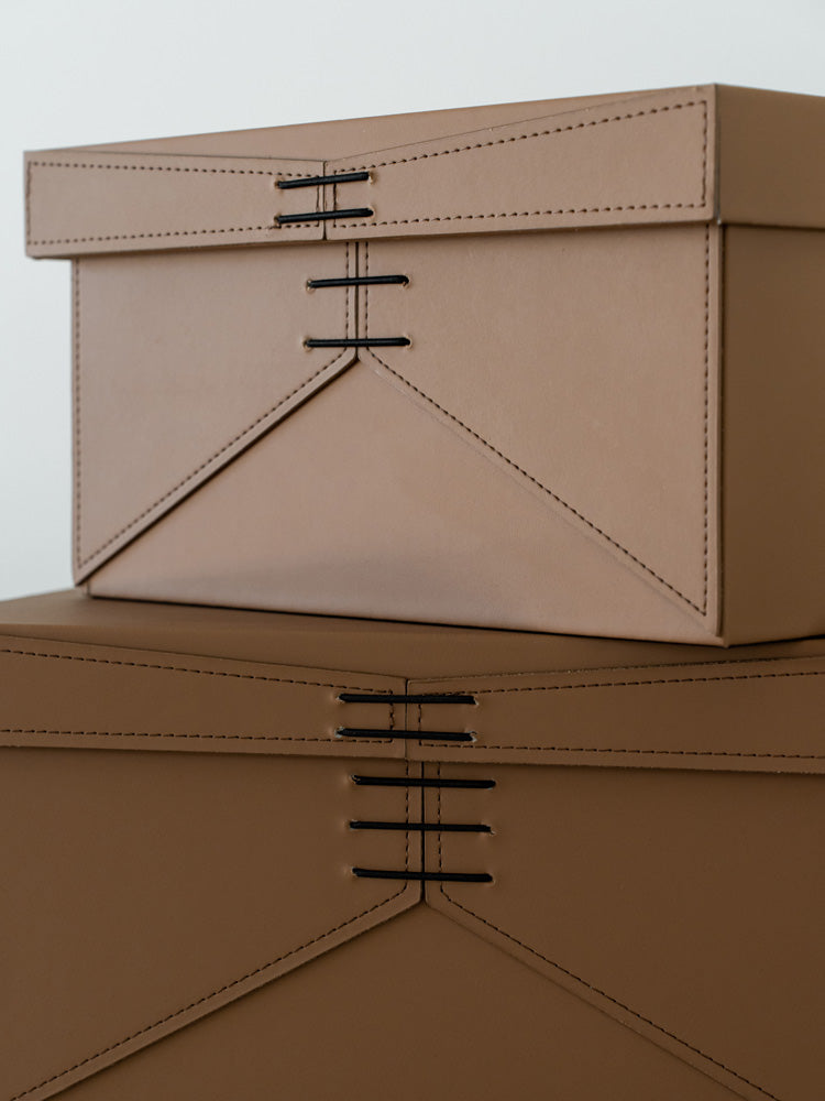 Elegant small storage box crafted from premium PU leather with a soft velvet interior, ideal for organizing jewelry, accessories, and everyday essentials in modern and minimalist interiors.