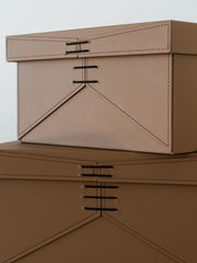 Elegant small storage box crafted from premium PU leather with a soft velvet interior, ideal for organizing jewelry, accessories, and everyday essentials in modern and minimalist interiors.