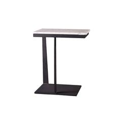 The Fitz Side Table featuring a smooth Yugoslav white natural stone tabletop paired with a sleek carbon steel frame foot.