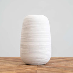 White ceramic Grafo Medium Vase with textured circular lines, perfect for modern home décor and floral arrangements.