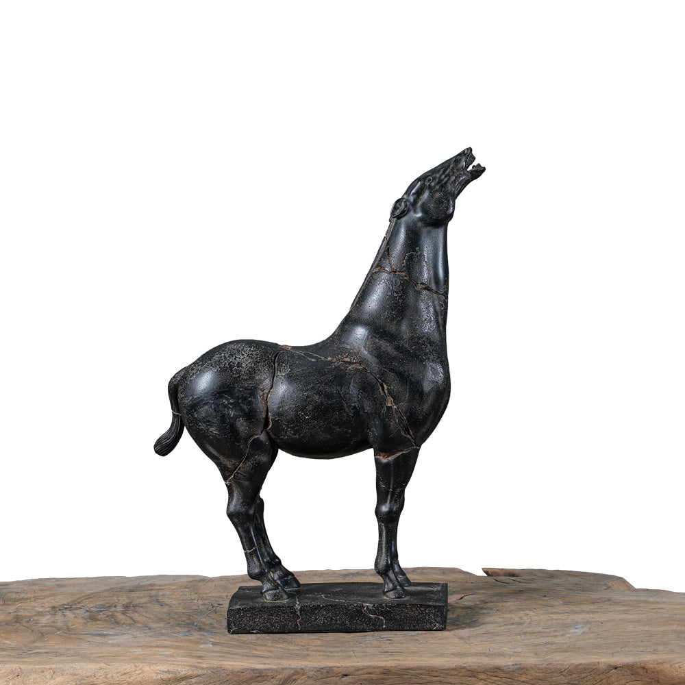 Unique hand-carved war horse sculpture with aged cracks and artisanal detail. A one-of-a-kind art piece that adds elegance and character to any space.
