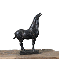 Unique hand-carved war horse sculpture with aged cracks and artisanal detail. A one-of-a-kind art piece that adds elegance and character to any space.