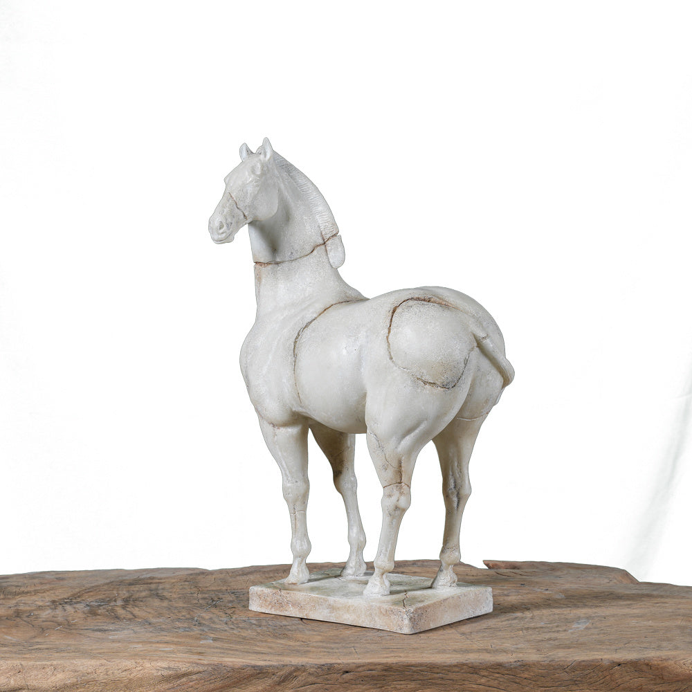 Unique hand-carved war horse sculpture with aged cracks and artisanal detail. A one-of-a-kind art piece that adds elegance and character to any space.