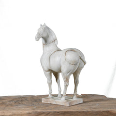 Unique hand-carved war horse sculpture with aged cracks and artisanal detail. A one-of-a-kind art piece that adds elegance and character to any space.