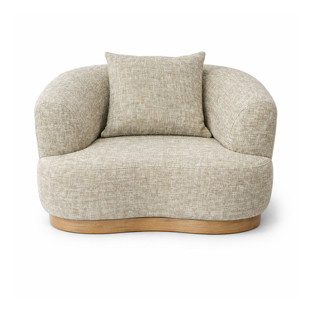 Modern curved armchair upholstered in beige textured fabric, featuring a sculptural silhouette and comfortable contemporary design ideal for living rooms and designer interiors.