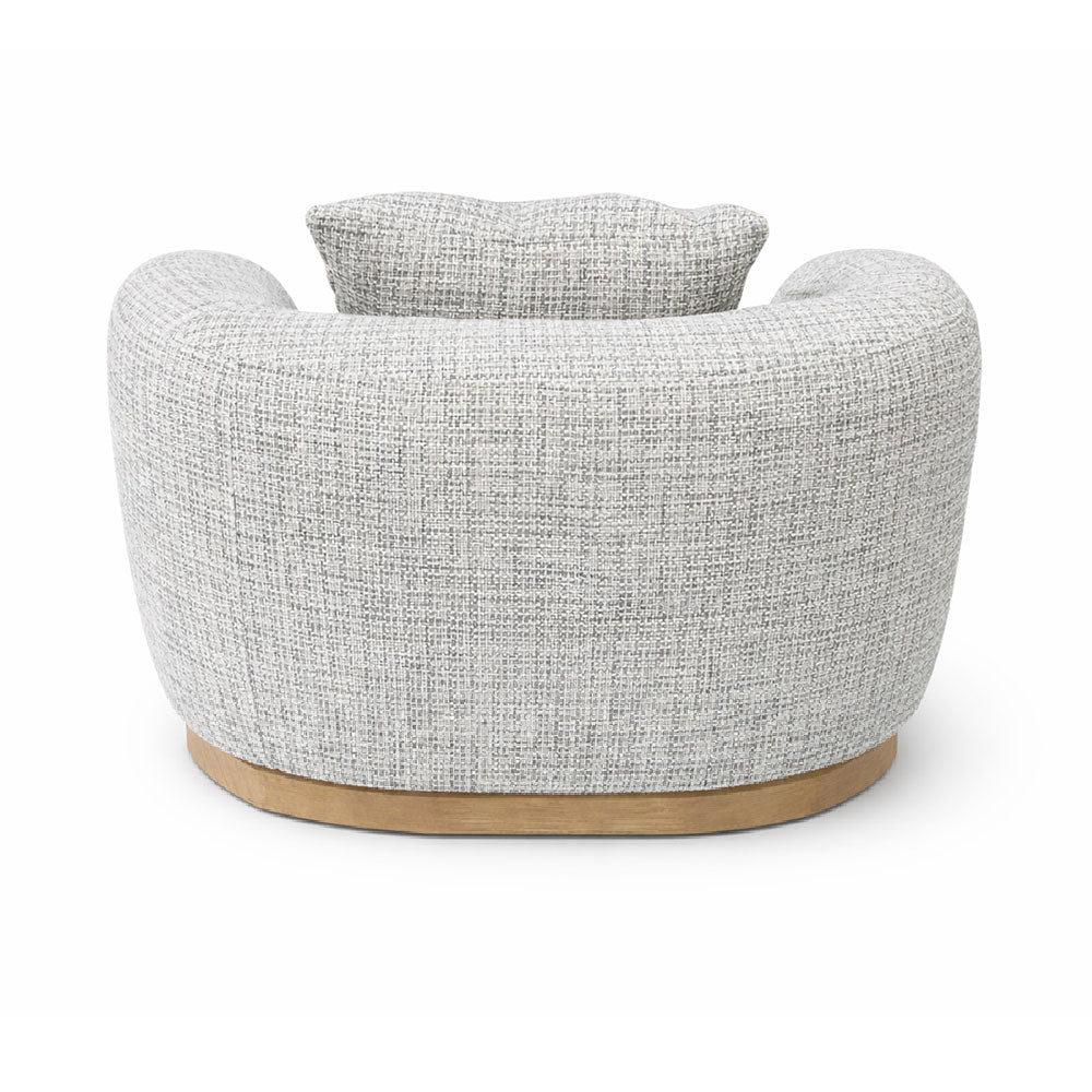 Designer armchair in grey textured upholstery with a smooth curved form, ideal as a statement seating piece for modern homes and interiors.