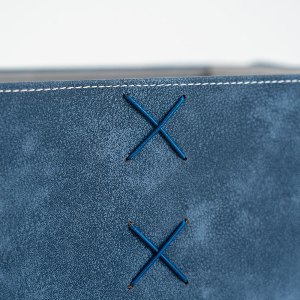 Multi-purpose storage box with side handles for easy carrying and functionality.