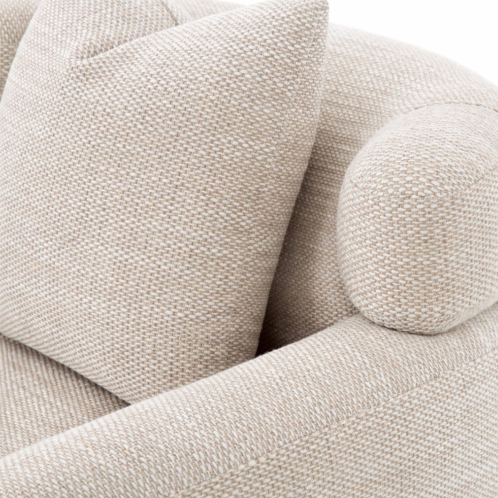 Comfortable and elegant accent armchair with woven fabric, sleek curves, and refined silhouette, ideal for reading corners or living spaces.