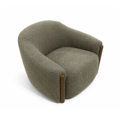 Comfortable designer armchair with textured olive green upholstery and wooden armrest detailing, perfect for living rooms, lounges, and modern interiors.