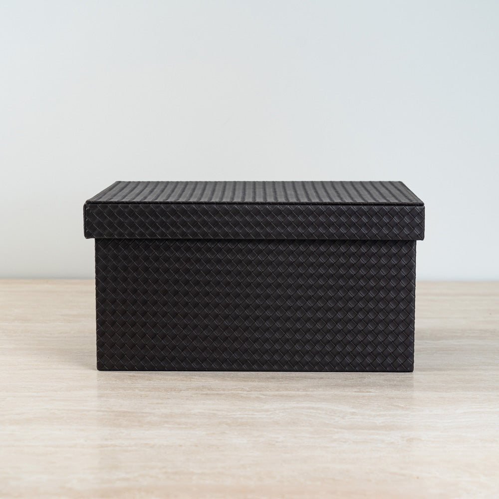 Woven jewelry organizer with a clean, refined minimalist design.