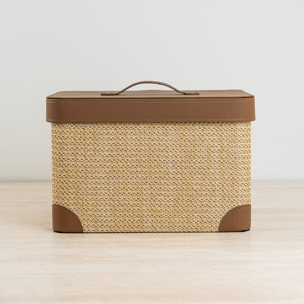 Jett storage box featuring a woven body and tan leather-look lid for stylish home or office organization.