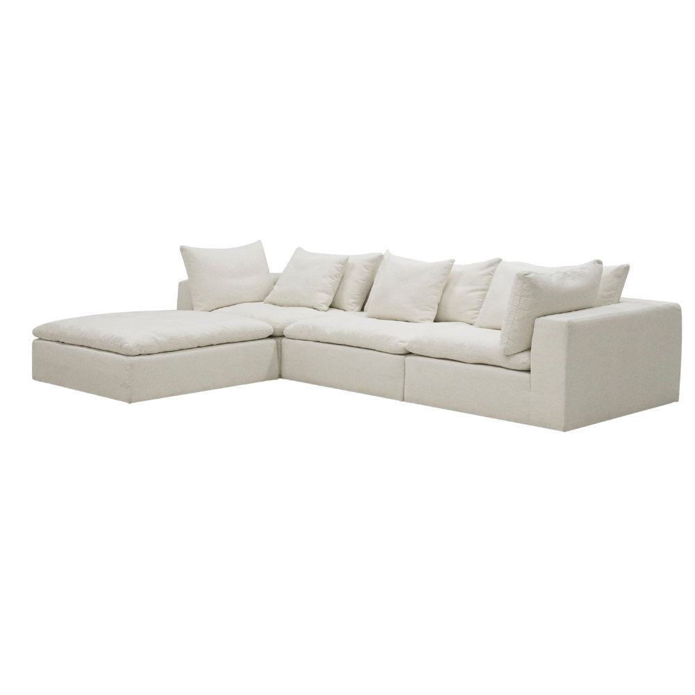 Close-up of the Kali Sofa’s sumptuous duck feather cushions and soft woven upholstery, showcasing the rich texture and luxurious comfort of the design.