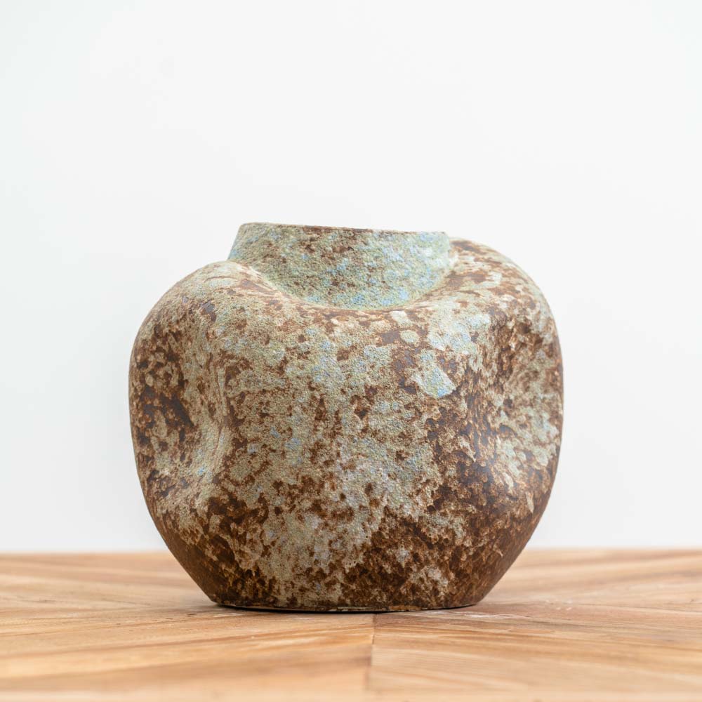 Handmade relic-style ceramic vase with crumpled sides and blue, grey, and green moss accents, ideal for modern, boho, or rustic décor.