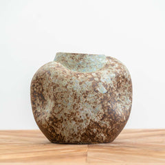 Handmade relic-style ceramic vase with crumpled sides and blue, grey, and green moss accents, ideal for modern, boho, or rustic décor.