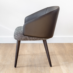 Luisa Contemporary Dining Chair with mixed-material design, fabric seat, PU leather back, and ash wood frame, elegant seating for kitchens or dining rooms.