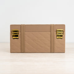 Elegant multi-purpose storage chest combining luxury and functionality.