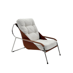 Premium accent chair with sculptural two-tone leather design and polished chrome legs, ideal for living rooms or stylish home offices.
