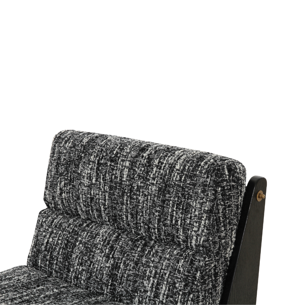 Modern Lyob accent chair featuring soft green fabric cushions and a sturdy dark wood base, perfect for living rooms or reading corners.