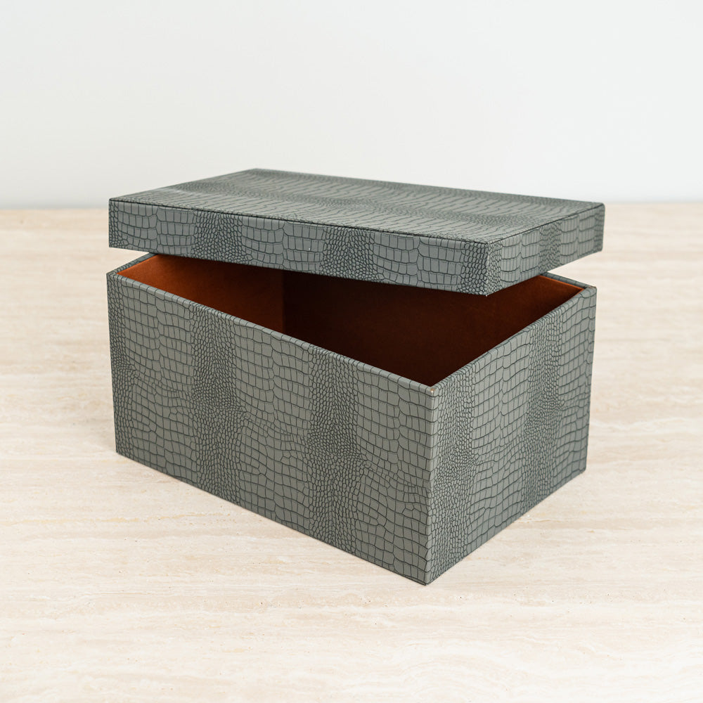 Blue croc-patterned jewelry storage box with luxe orange velvet inner lining