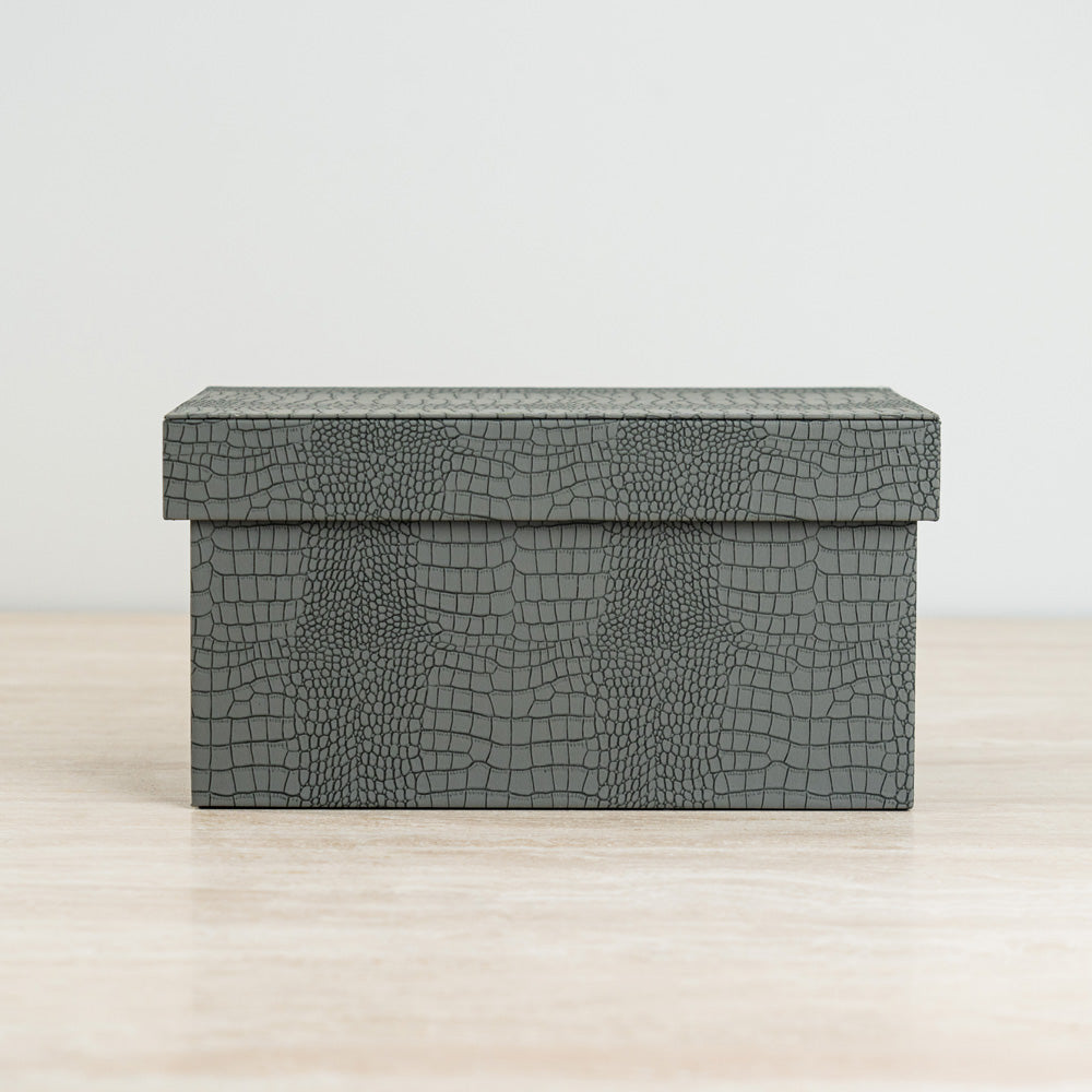 Luxury blue organizer with textured crocodile exterior and soft velvet lining