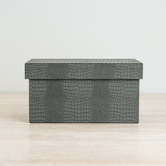 Luxury blue organizer with textured crocodile exterior and soft velvet lining
