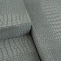 Modern luxury storage box with a blue crocodile pattern and soft velvet interior