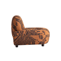 Artistic Maska Chair with dramatic patterned upholstery, durable wood frame and low-profile base, ideal for eclectic interiors.