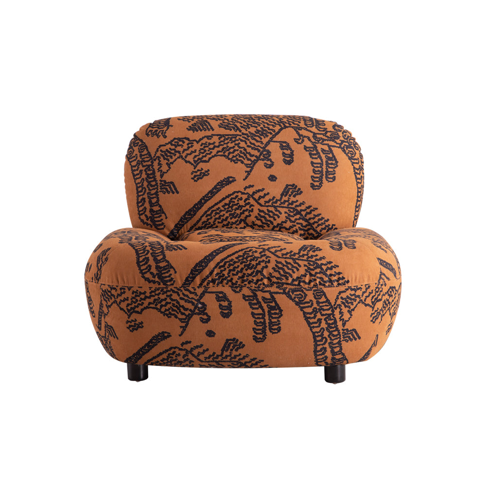 Modern accent chair with artistic printed fabric, curved backrest, and solid wood feet, perfect for living rooms or bedrooms.