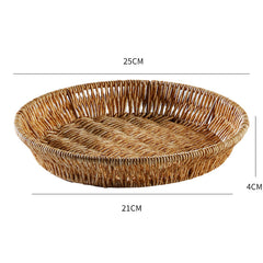 Medium round plate-style storage basket made from durable plastic rattan, perfect for accessories or household essentials.