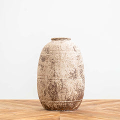 Medium handcrafted ceramic vase with a full rounded shape, aged etched detailing, and a smoky rustic finish, perfect for modern rustic or boho home décor.