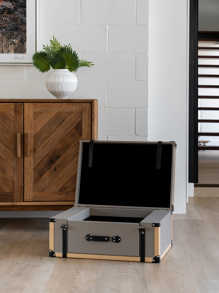 Luxurious large PU leather storage box with a suitcase-style lid and plush velvet interior, offering elegant and functional storage for modern and contemporary home décor.