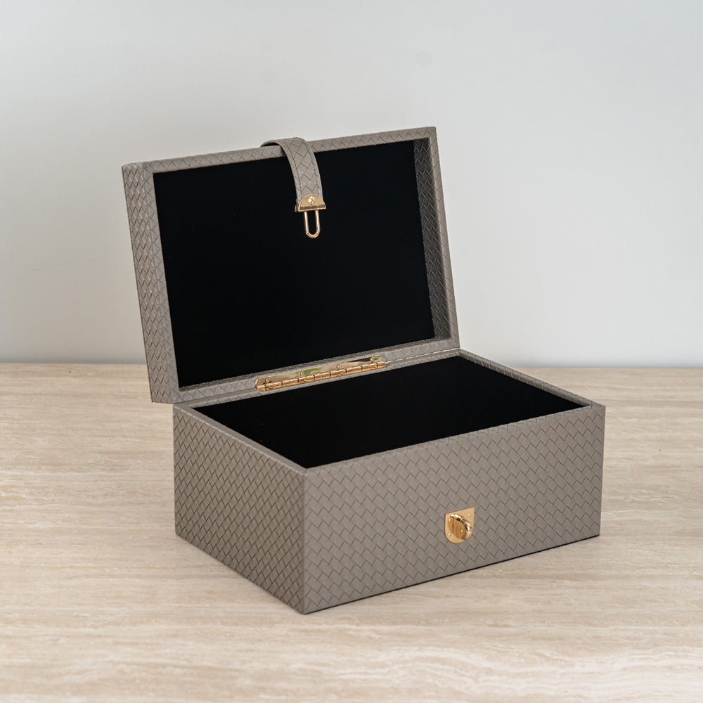 Versatile storage chest for jewelry, documents, and personal essentials.