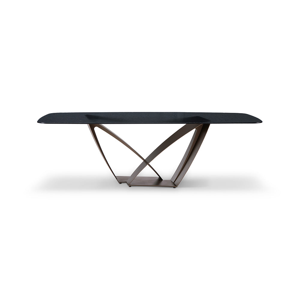Close-up of the Byron Dining Table’s 12mm translucent ripple water glass surface with rounded edges, highlighting the artistic texture.