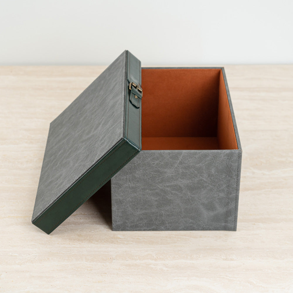 Dark green-lid storage box offering durability and understated elegance.