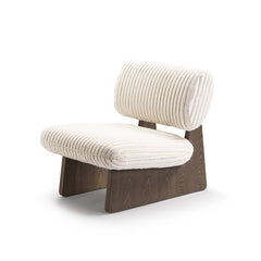 Wynn chair showing soft fabric and curved contours