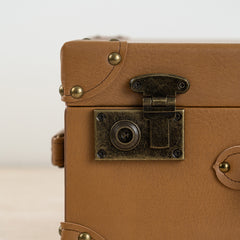 Elegant tan storage box ideal for home décor and functional organization.