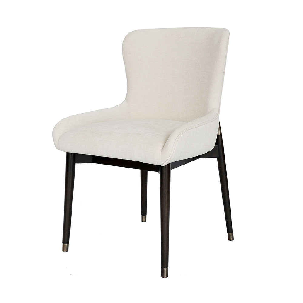 Nanna Dining Chair in white or grey featuring rubberwood frame, foam padding, gold-brushed caps, and meticulous piping details for modern comfort and elegance.