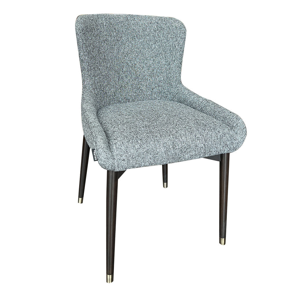 Nanna Dining Chair in white or grey featuring rubberwood frame, foam padding, gold-brushed caps, and meticulous piping details for modern comfort and elegance.